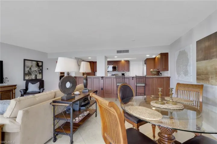 Dining room with light tile patterned floors