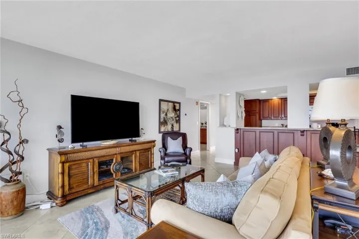 Living area featuring light tile patterned flooring