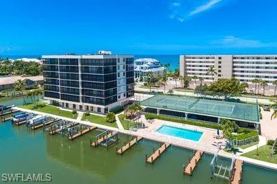 Bird's eye view of a large body of water and apartment complex
