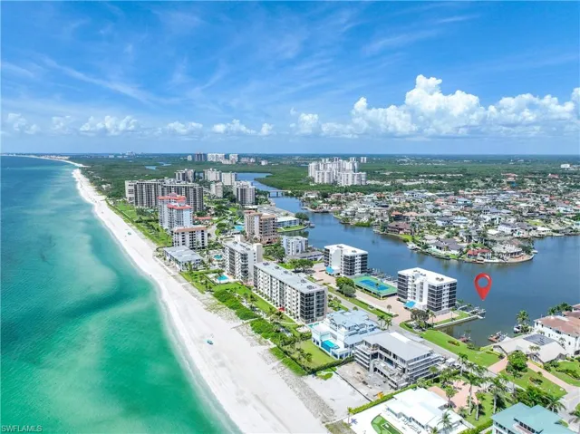 View of urban area with expansive beach