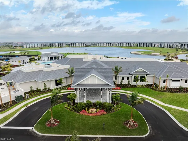 Bird's eye view of a large body of water and apartment complex / building