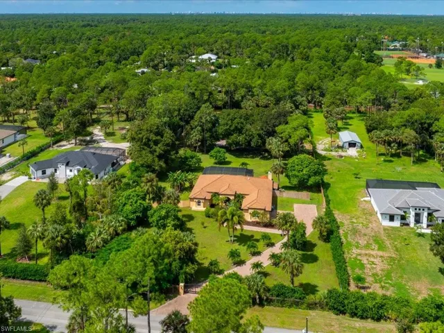 Aerial of Pool Home and Workshop / Horse Barn