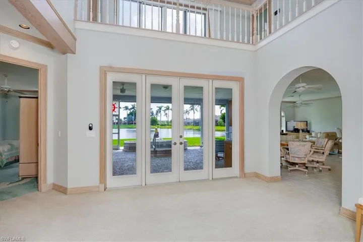 Living Room w/view of out door living space/lanai