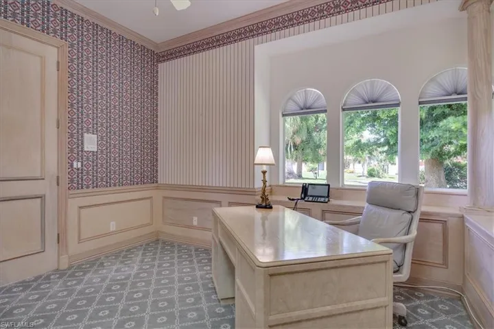 Office Space w/closet, credenza and view of the front of property