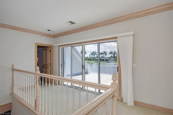 Upstairs landing w/access to balcony