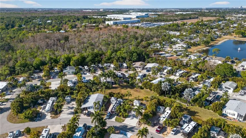 View of property location with nearby suburban area and a large body of water