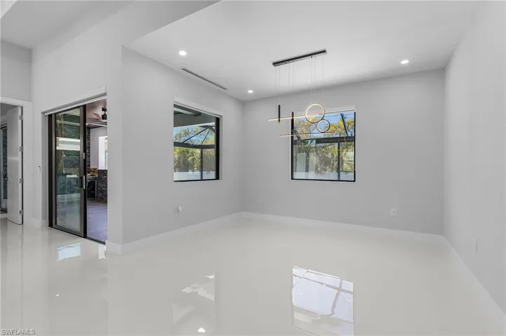 Spare room with visible vents, recessed lighting, and baseboards