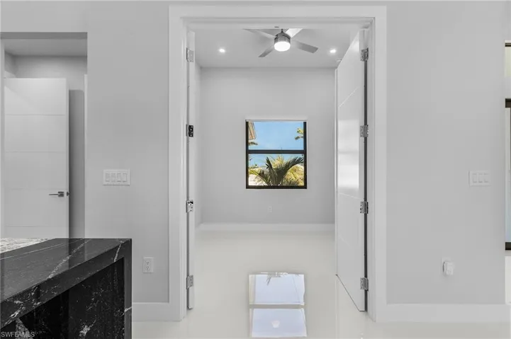 Hallway featuring recessed lighting