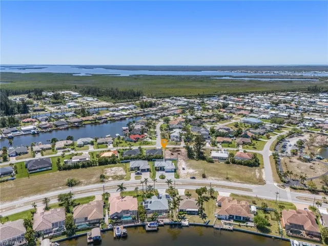 Aerial view with a residential view and a water view