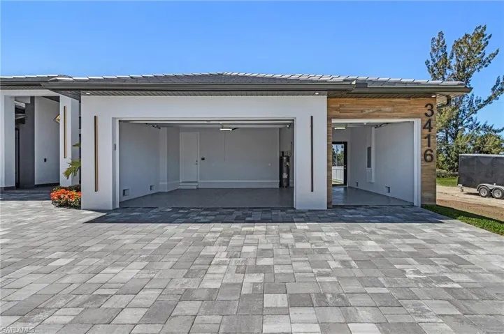 Garage with decorative driveway
