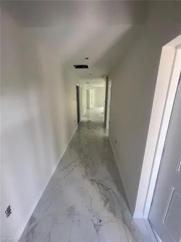 Corridor with tile floors