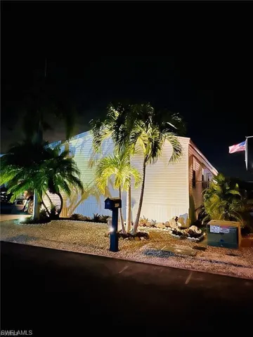 View of property exterior at night