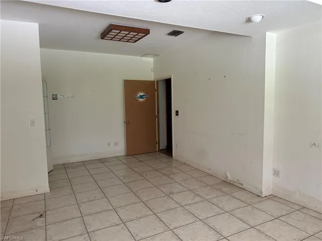 View of tiled spare room Downstairs