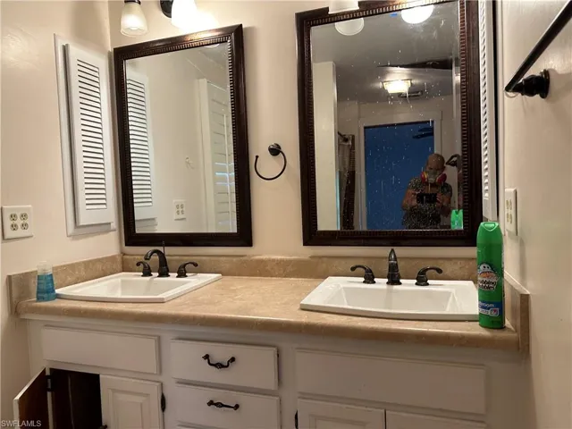 Bathroom featuring dual vanity