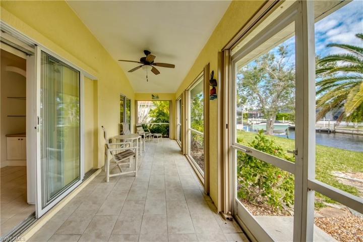 Large screened in lanai under truss with pocket sliders from great room & master bedroom.