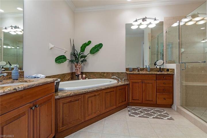 Double sinks, walk in shower and separate tub