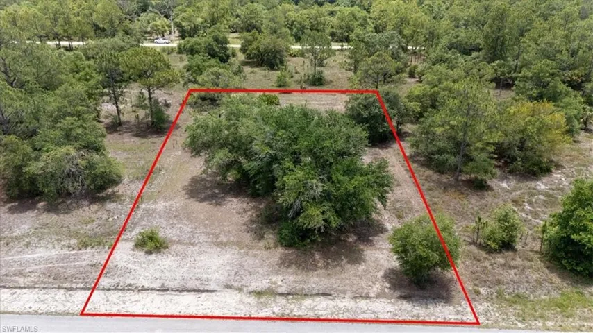 Aerial view of property's location featuring property parcel outlined