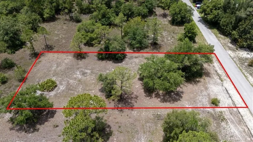 Aerial overview of property's location with property parcel outlined