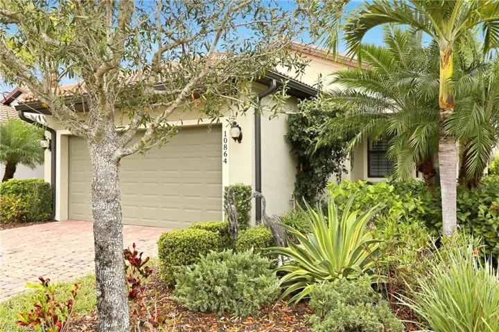 View of side of property with with beautiful landscaping.