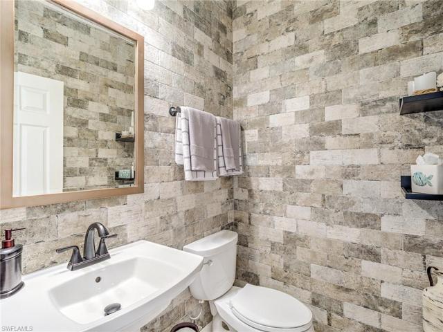 Having a Half Bath Conveniently located in Living Area, well serves your guests.
