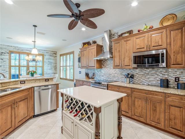 This custom center isle offers as wonderful Wine Rack, and great detail