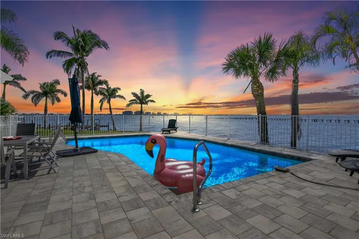 Dive into luxury! Sparkling pool perfectly positioned to soak up southwest-facing sunsets.