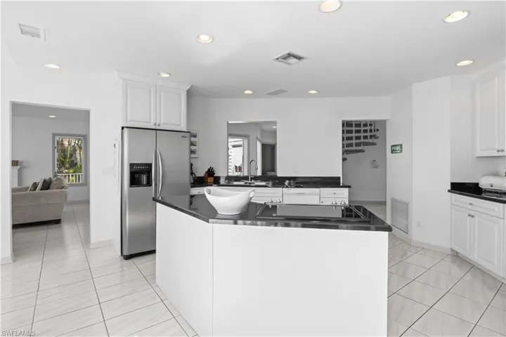 Cook and entertain in a bright kitchen designed for both beauty and function.
