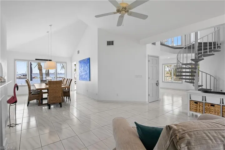 Dine with a view – bright and open dining area overlooking the water.