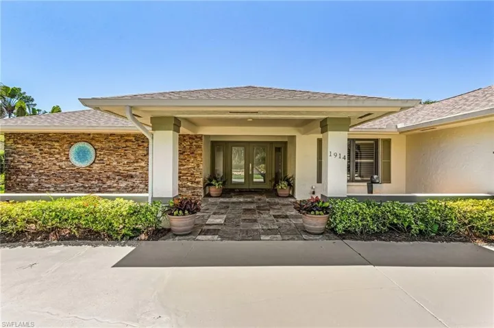 Property entrance with french doors