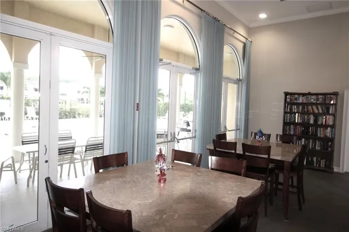 Dining room with french doors and crown molding