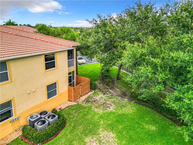 View of yard with central AC