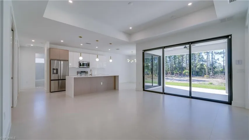 Open Floorplan, expansive 8' sliding doors, high tray ceilings, gorgeous views!