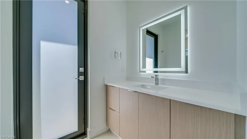Cabana bathroom with access to your future pool!