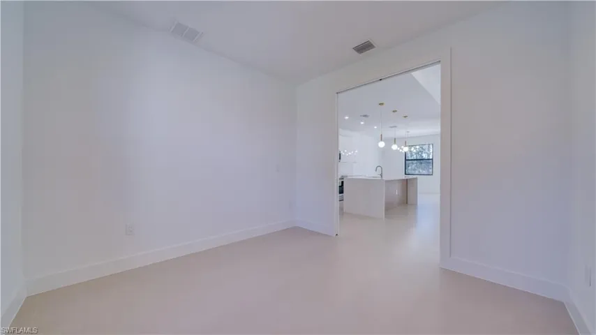 Den off living area; pocket doors