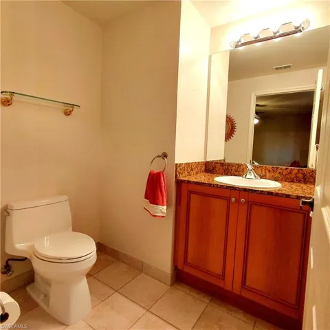 Bathroom featuring vanity and light tile patterned floors