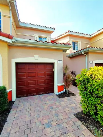 Garage with decorative driveway