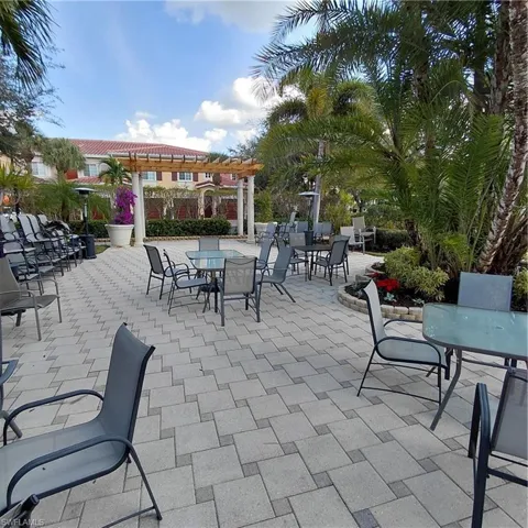 View of patio / terrace with a pergola and outdoor dining space