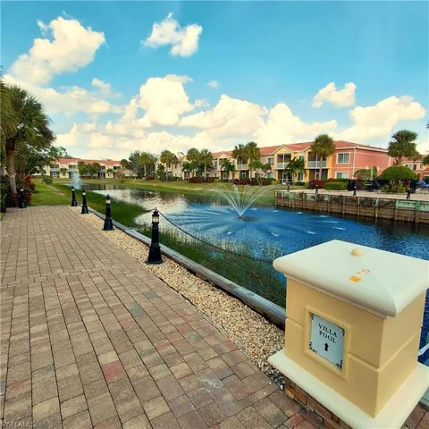 View of community featuring a water view and a residential view