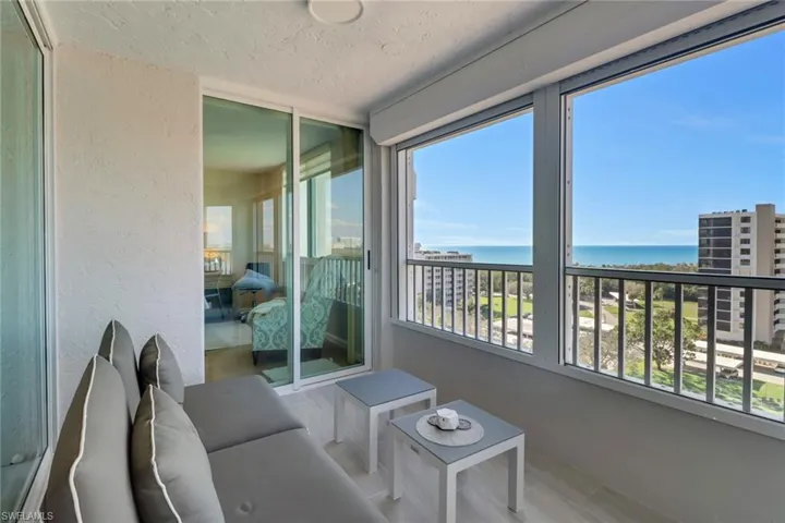 Wrap-around main lanai features Gulf and canal views.
