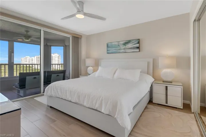 Guest bedroom with private lanai overlooking canal.