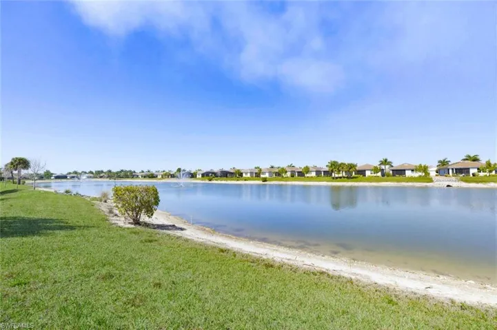 Water view featuring nearby suburban area