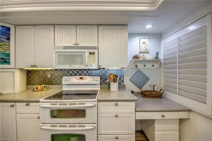 Kitchen with built in desk