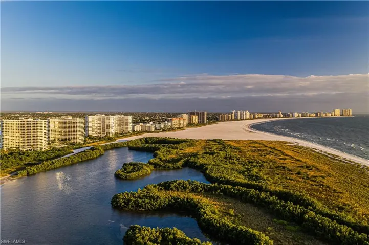 View of water feature featuring a view of city and a view of the beach