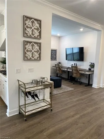 Open floor plan living provides room for special features like a bar cart