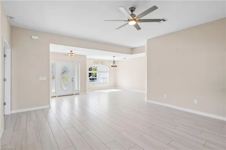 Inviting front entry that opens to a comfortable great room and dining area.