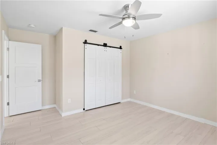 Light-filled room ideal for visitors, home office, or flexible use.