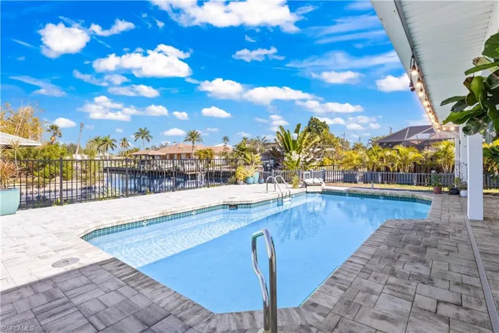 Inviting poolscape surrounded by elegant pavers, ideal for everyday enjoyment.