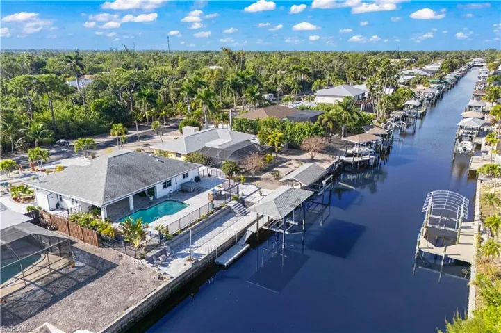 Tranquil deep-water canal views offering effortless boating straight to the Gulf in minutes.