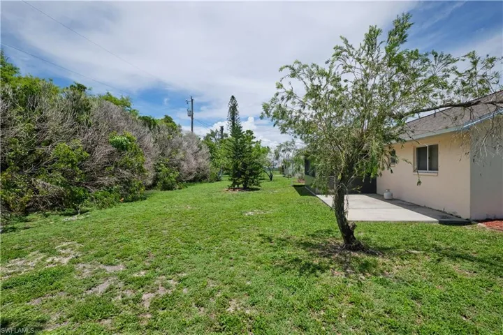 View of yard with a patio