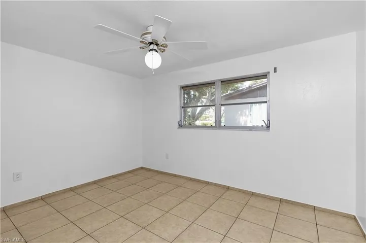 Empty room with a ceiling fan